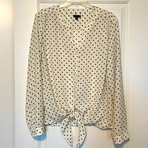 Talbots cream with navy polkadot long sleeve blouse with tie front.